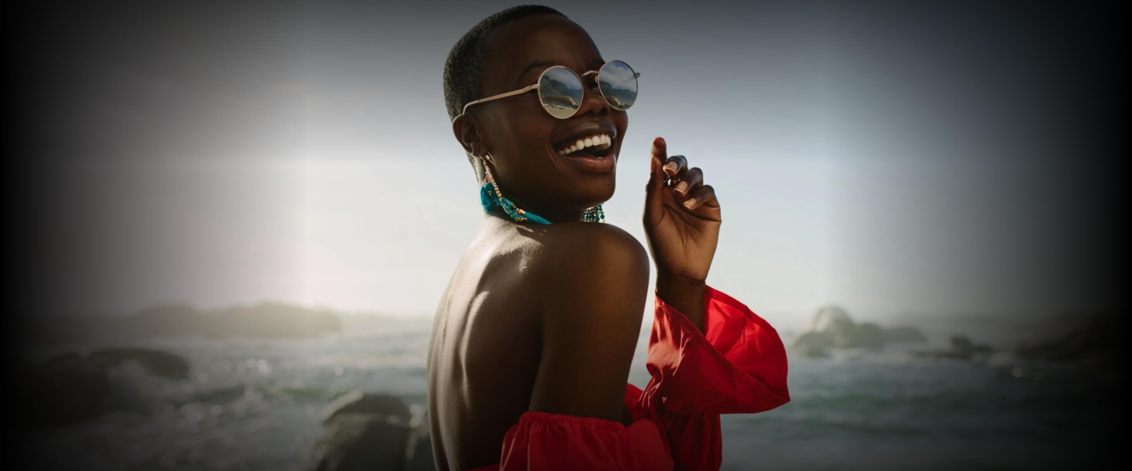 Woman with glasses smiling